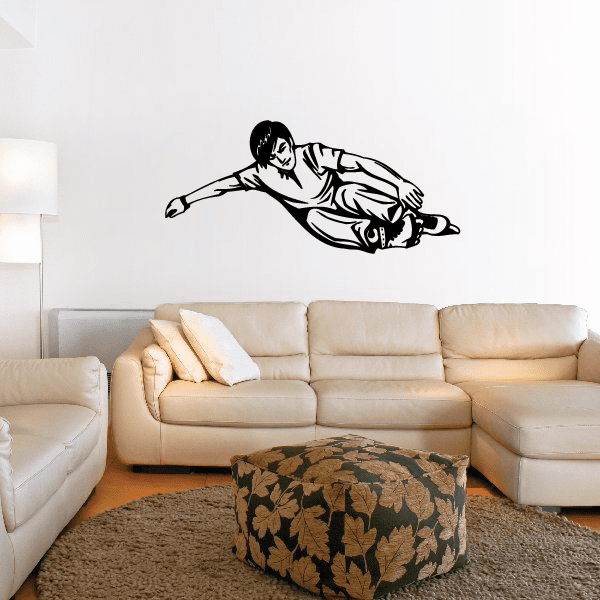 Rollerblading wall decal, black vinyl sticker of a skater in mid-sprint