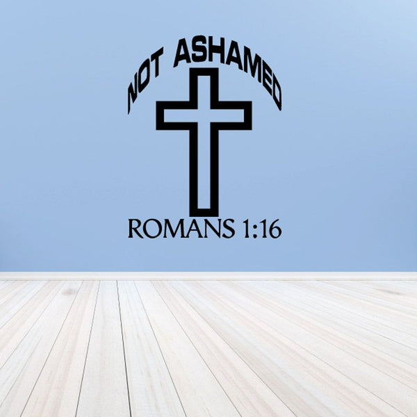 Black cross wall decal with Not Ashamed and Romans 1:16 text