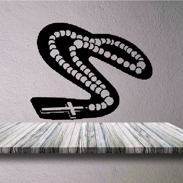 Rosary cross decal with black outline and white bead pattern