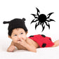 Black rounded spider vinyl decal with spiky legs and body