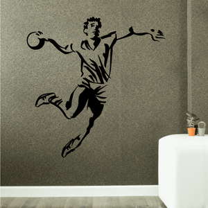 Rugby player pose wall decal with black silhouette on textured light green surface