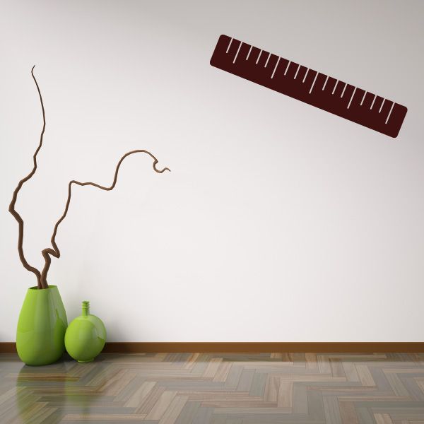 Maroon wall ruler decal with white measurement ticks and numbers