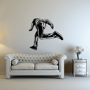 Parkour jumping wall decal, black silhouette of a runner mid-leap
