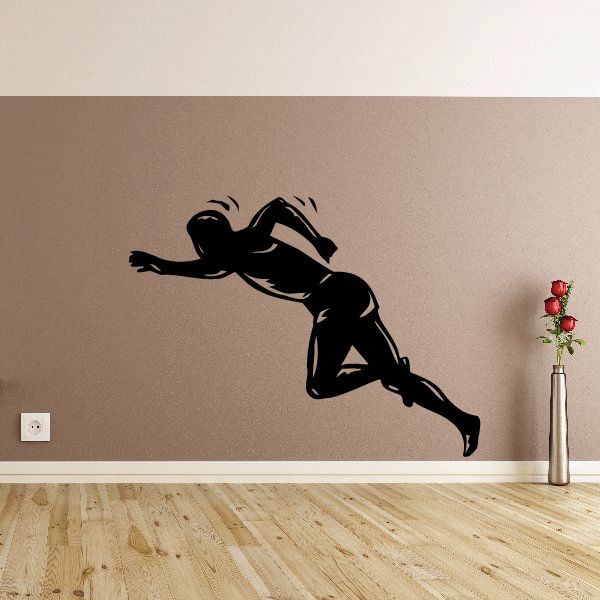Running wall decal of black sprinter silhouette, dynamic pose
