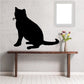 Cat silhouette wall decal in a sitting pose with curled tail