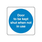 Safety sign decal with blue circle: 'Door to be kept shut when not in use'