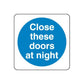 Safety sign wall decal: blue circle with white text "Close these doors at night"