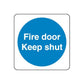 Safety sign decal: blue circle text 'Fire door Keep shut'