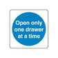 Safety sign wall decal with blue circle and white text: Open only one drawer at a time
