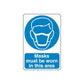 Safety sign vinyl decal with blue mask icon and text 'Masks must be worn in this area'