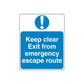 Square safety sign decal, blue with white exclamation and 'Keep clear Exit from emergency'.