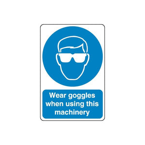 Safety sign wall decal: blue goggles icon with text 'Wear goggles when using this machinery'.