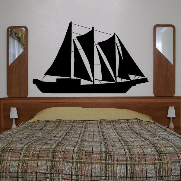 Sailboat wall decal with black sails and light-colored hull