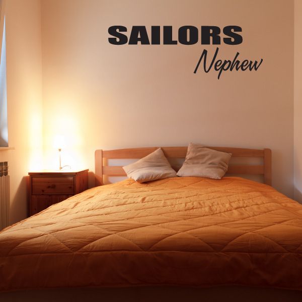 Black wall decal reading 'SAILORS' and 'Nephew'.