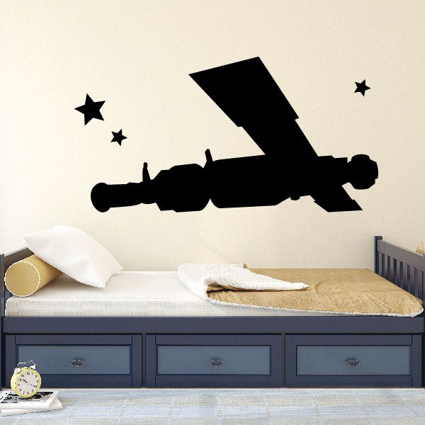 Satellite and stars wall decal, black silhouette with star shapes.