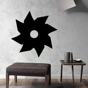 Black star-shaped ninja star decal with round center cutout