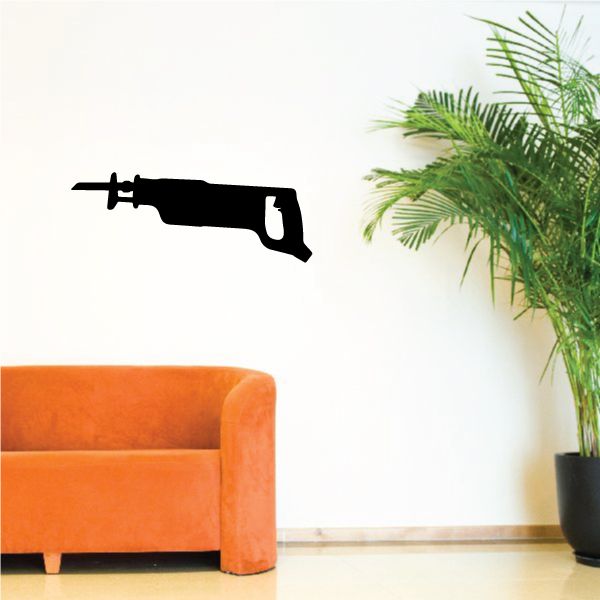 Sawzall decal with black power saw silhouette on wall