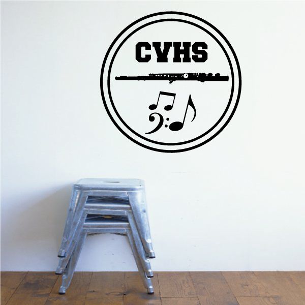 Round marching band decal with CYHS text and musical note icons in black circle
