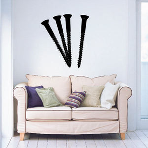 Screws decal featuring three black screws on wall