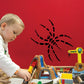 Black spider wall decal with dashed legs