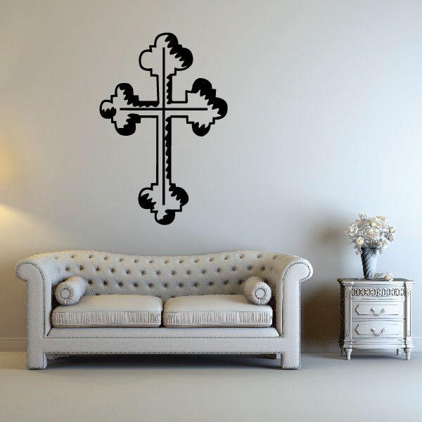 Cross wall decal with dark decorative flourishes and curled vine ends