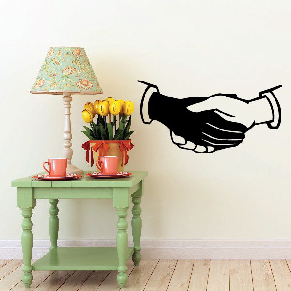 Black shaking hands wall decal with two clasped hands outline