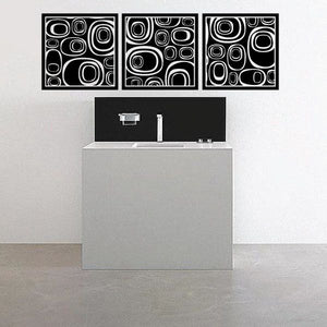 Three-square abstract pebbles wall decal set with black and white circular shapes