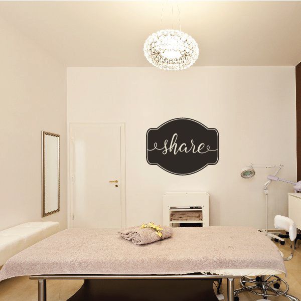 Share wall decal: black circle with white cursive 'share' lettering
