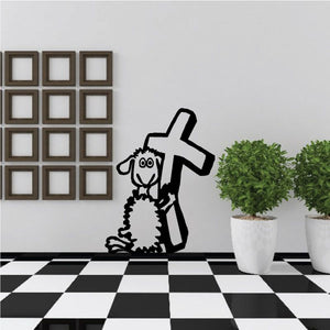 Black sheep holding cross decal with cross silhouette