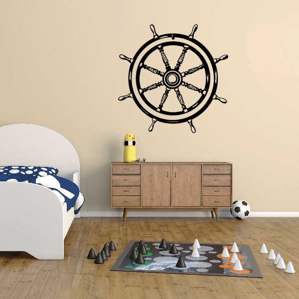 Black ship wheel wall decal with detailed spokes and central hub