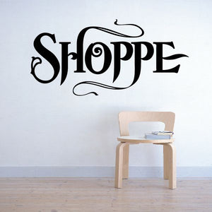 Vinyl wall decal with black Shoppe lettering and decorative curls