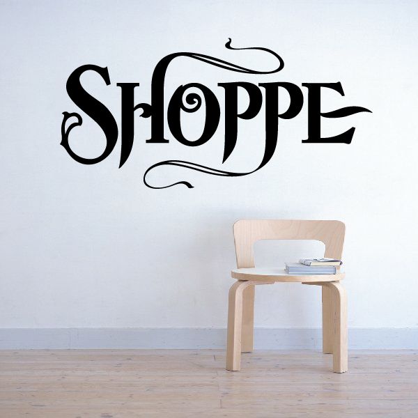 Vinyl wall decal with black Shoppe lettering and decorative curls