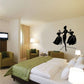 Fashion girl wall decal with three black silhouette figures in dresses