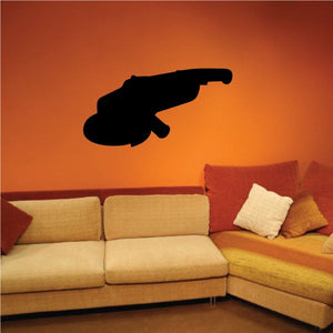 Side grinder decal, black tool silhouette shape on wall