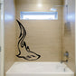 Black side-profile shark decal with stylized fin, tail, and open mouth.