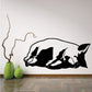 Side-sleeping pig wall decal in black with brown outline