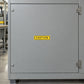 Rectangular caution sticker with yellow border and black CAUTION text