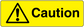 Caution yellow warning sticker with triangle exclamation icon and “Caution” text