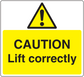 Yellow warning sticker with caution triangle and text: CAUTION Lift correctly