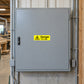 Rectangular warning sticker: 'Danger 110 volts' with hazard triangle