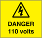 Yellow warning sticker with black triangle lightning and DANGER 110 volts text