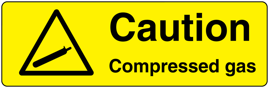 Caution compressed gas sticker with warning triangle and bold text on yellow background