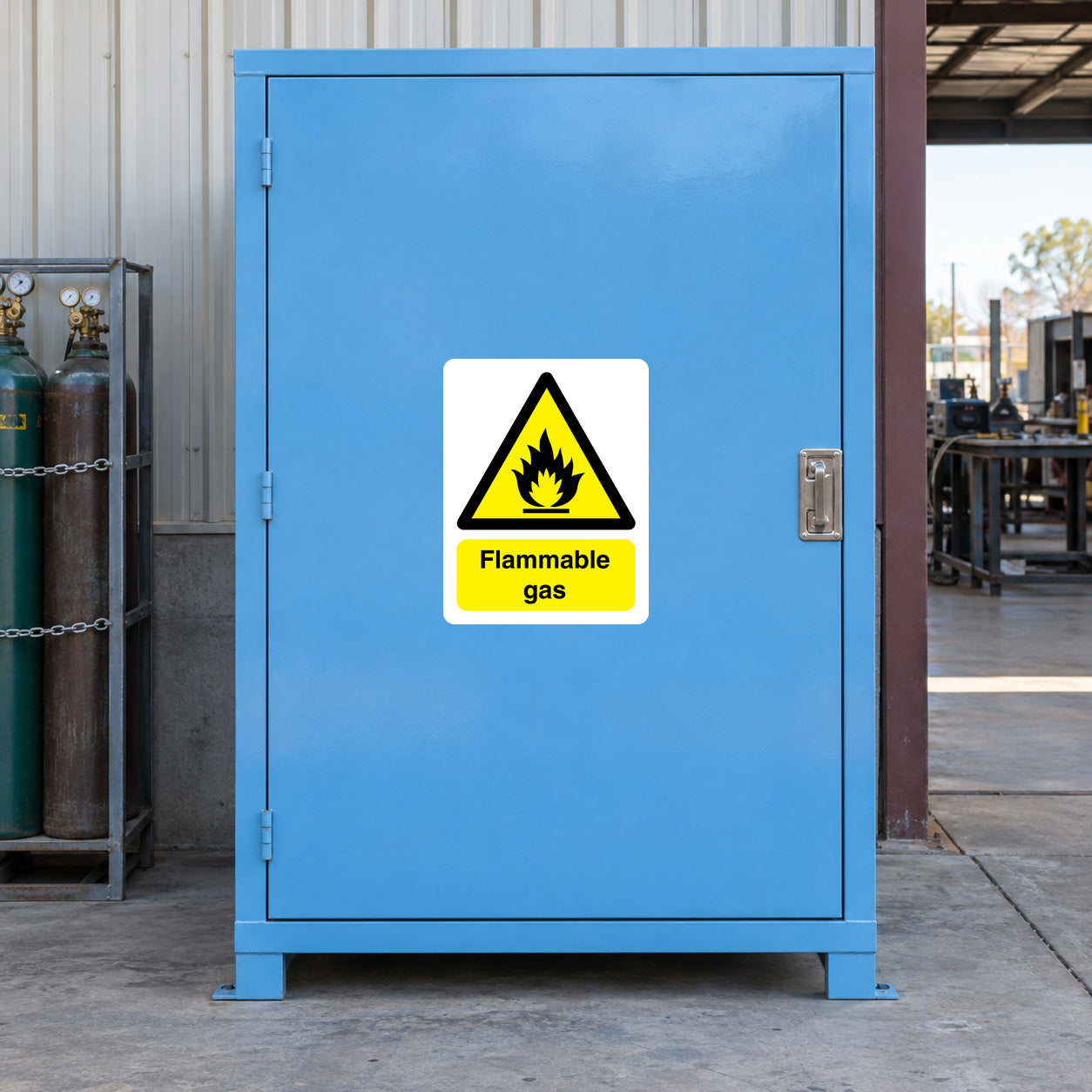 Flammable gas warning sticker with black flame triangle and yellow text