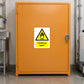 Warning sticker for oxidising agent on orange metal door with triangular hazard symbol