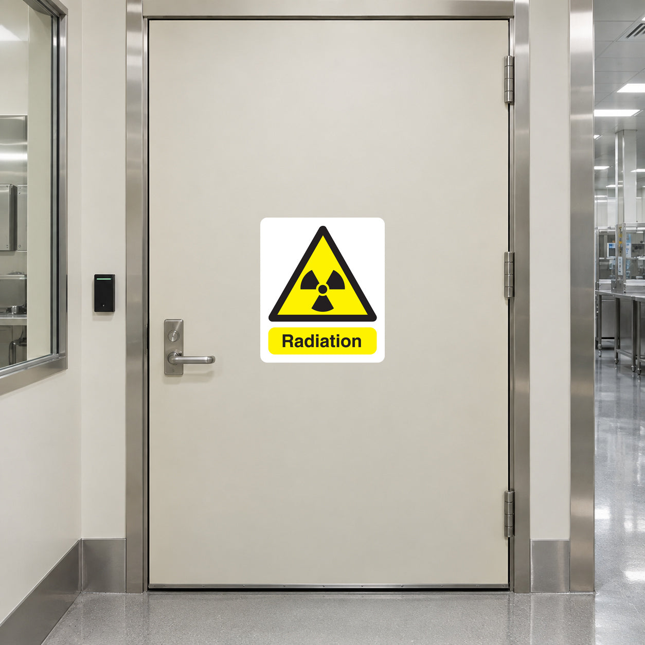 Radiation warning sticker with black and yellow hazard triangle and 'Radiation' text