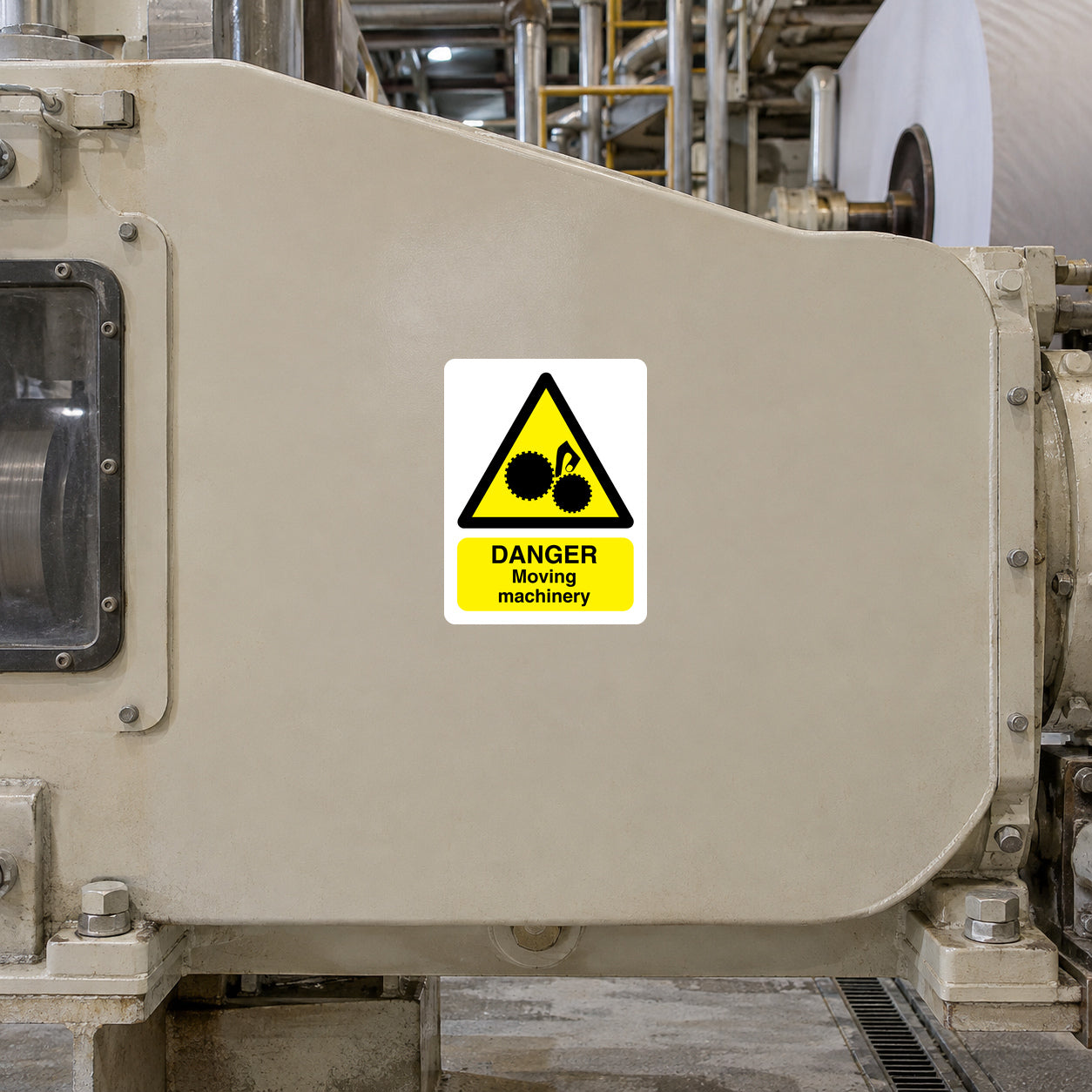 Safety hazard warning sticker on machinery: Danger moving machinery with yellow caution symbol