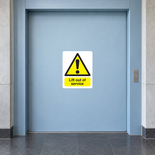 White caution sticker: yellow warning triangle, exclamation, “Lift out of service”