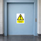 White caution sticker: yellow warning triangle, exclamation, “Lift out of service”