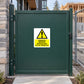 Yellow warning sticker with triangle text: Parents beware, building sites can be dangerous.