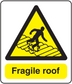 Caution fragile roof sticker with yellow warning triangle and Fragile roof text
